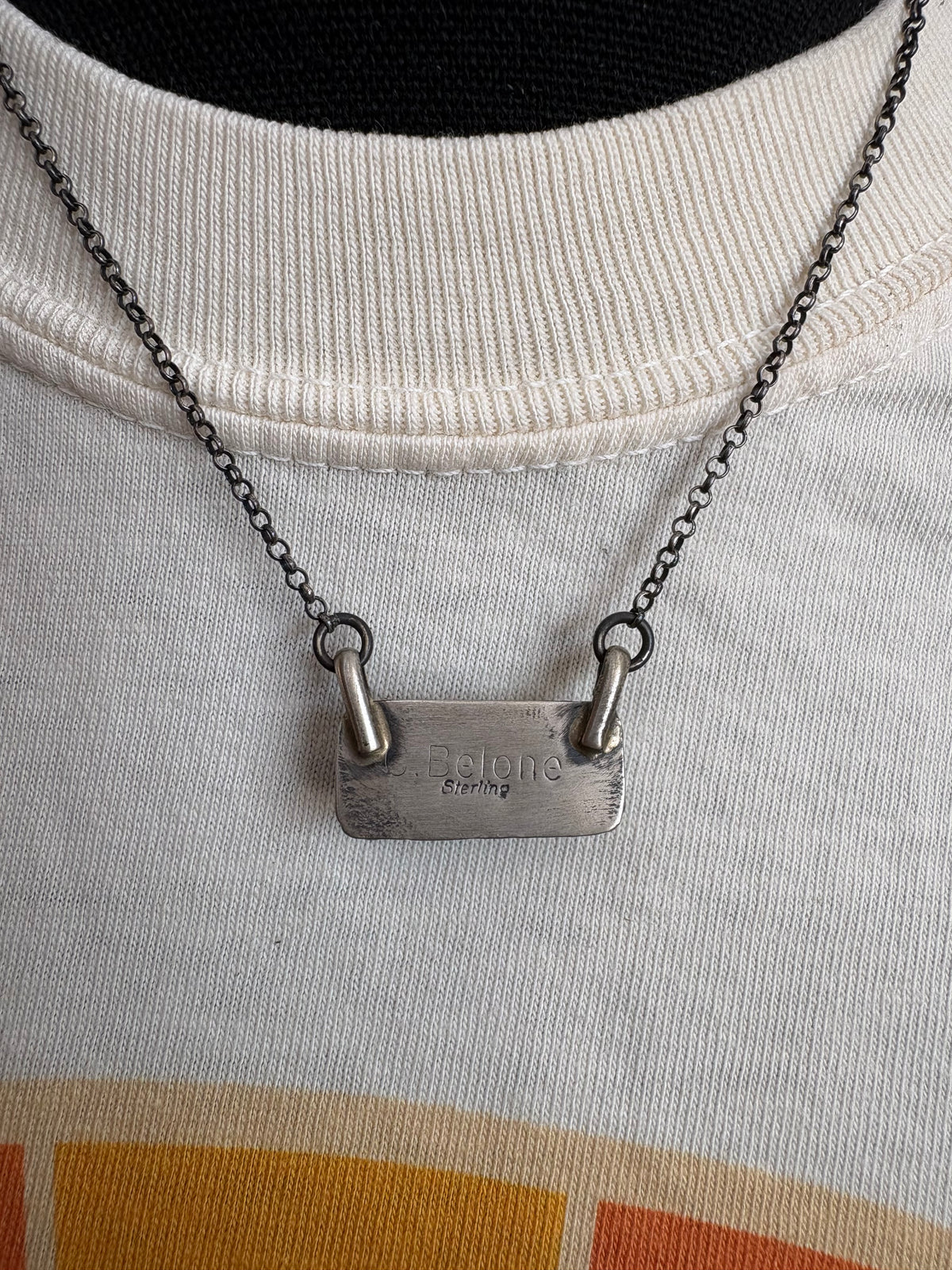 23. Chassity Belone mini turquoise bar necklace