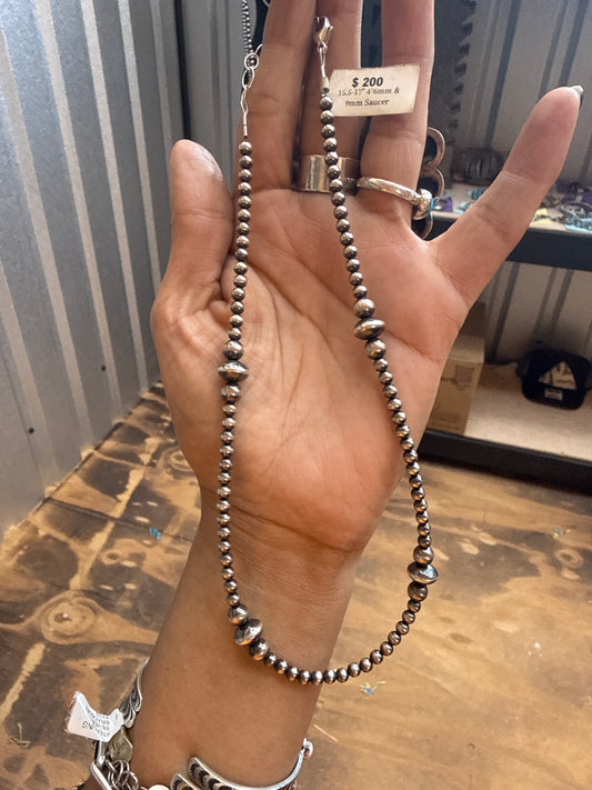 Robin Machine made 4-9mm saucer necklace