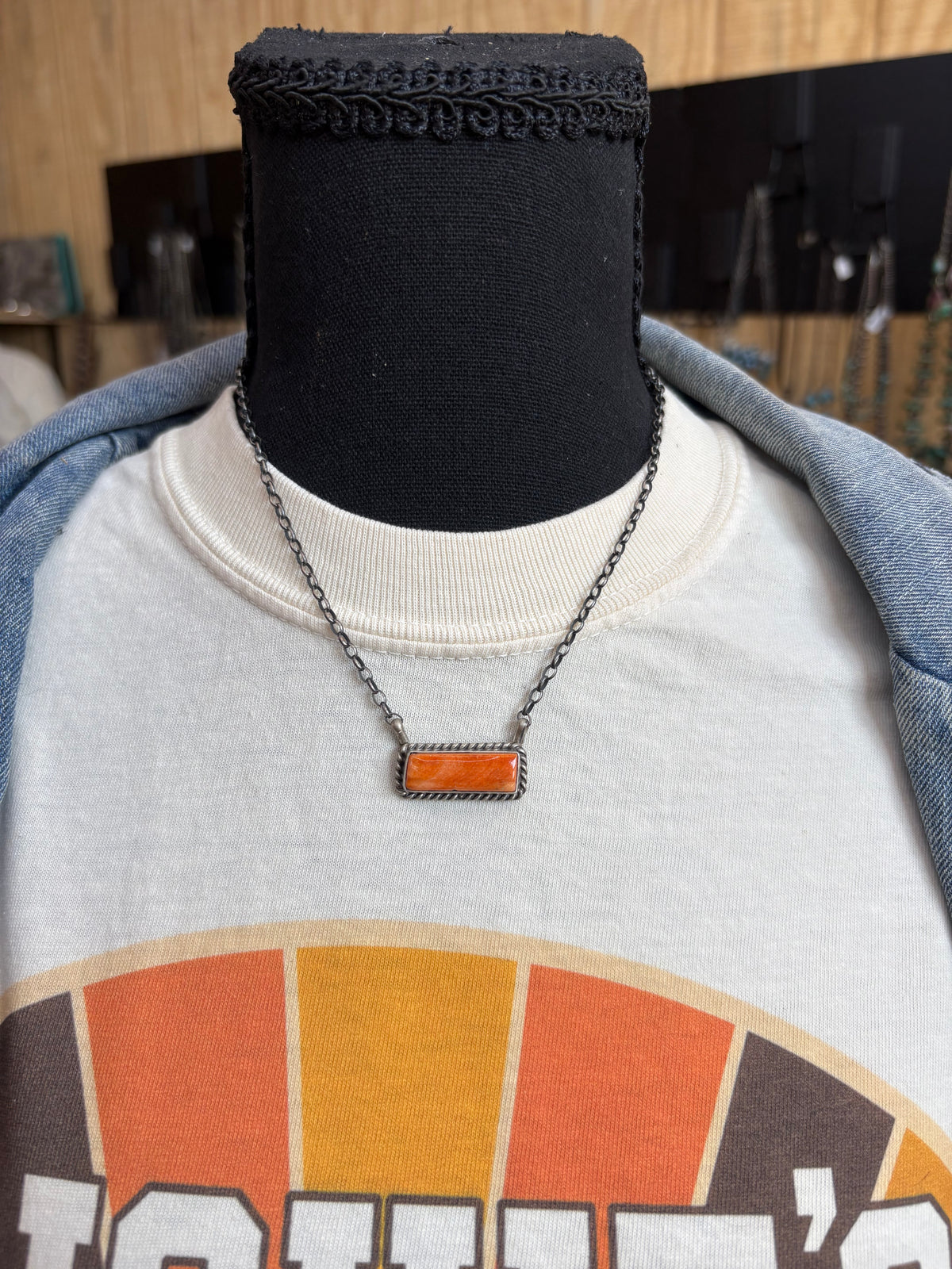 13. Chassity Belone Orange Spiny Bar