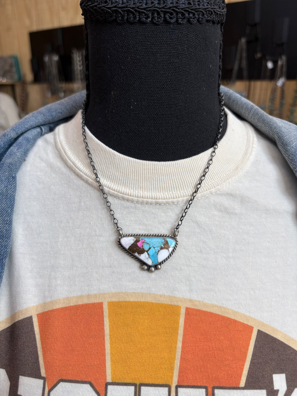 14. Chassity Belone Cotton Candy Bar Necklace