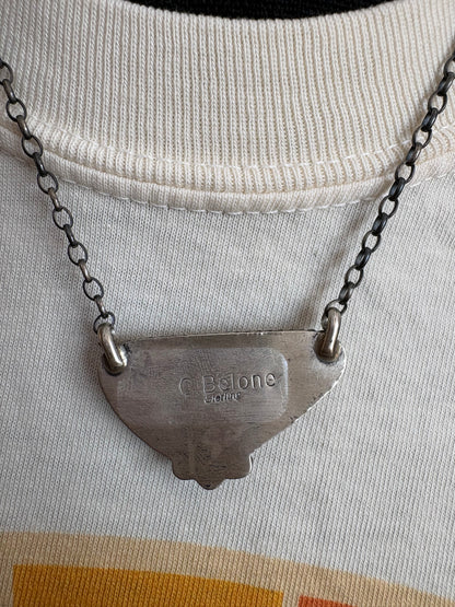14. Chassity Belone Cotton Candy Bar Necklace